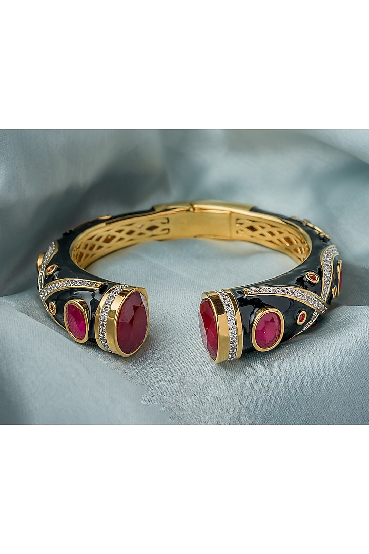 Gold Finish Red Gemstone Black Enameled Floral Cuff Kada by Vivinia By Vidhi Mehra at Pernia's Pop Up Shop