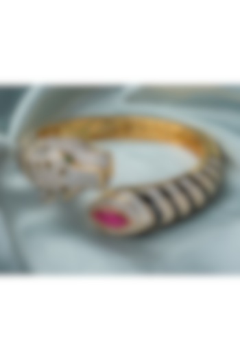 Gold Finish Red Gemstone Black Enameled Cuff Kada by Vivinia By Vidhi Mehra at Pernia's Pop Up Shop