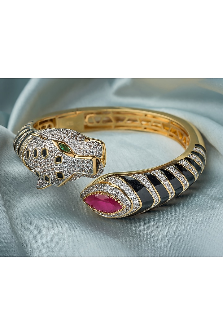 Gold Finish Red Gemstone Black Enameled Cuff Kada by Vivinia By Vidhi Mehra at Pernia's Pop Up Shop
