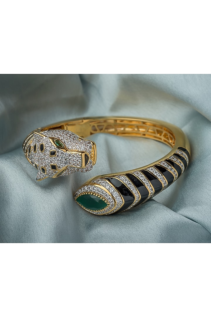 Gold Finish Green Gemstone Black Enameled Cuff Kada by Vivinia By Vidhi Mehra at Pernia's Pop Up Shop