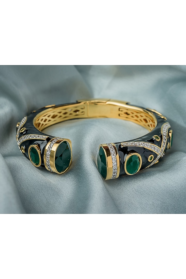 Gold Finish Emerald Green Gemstone Enameled Floral Kada by Vivinia By Vidhi Mehra at Pernia's Pop Up Shop