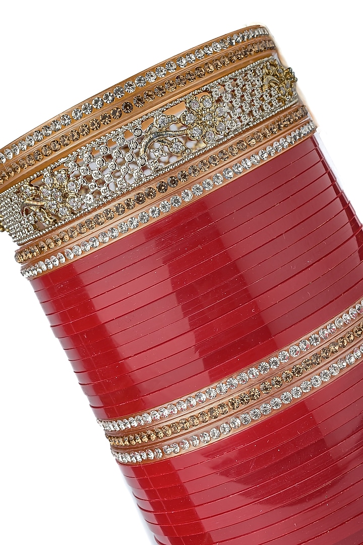 Gold Finish Red Chuda Bangles (Set Of 2) by Vivinia By Vidhi Mehra at Pernia's Pop Up Shop