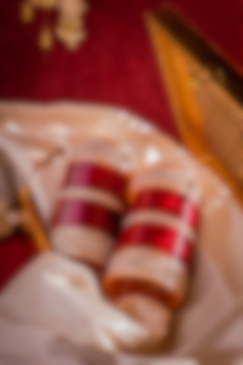 Gold Finish Red Chuda Bangles (Set Of 2) by Vivinia By Vidhi Mehra at Pernia's Pop Up Shop