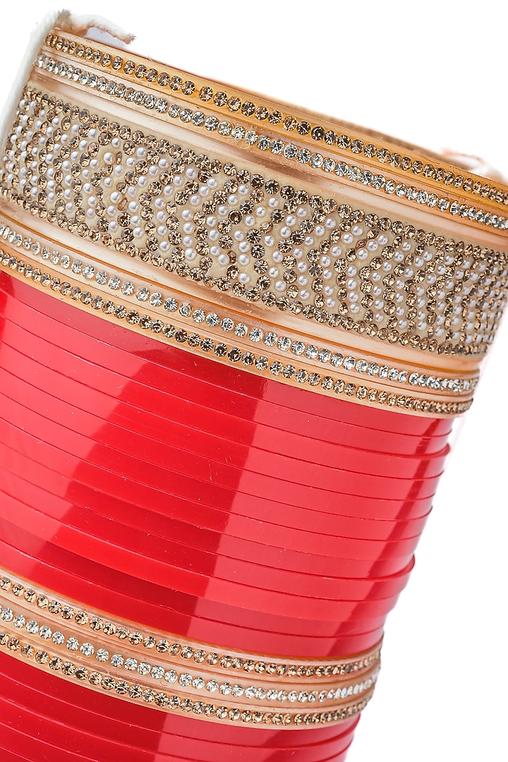 Gold Finish Red Chuda Bangles (Set Of 2) by Vivinia By Vidhi Mehra at Pernia's Pop Up Shop