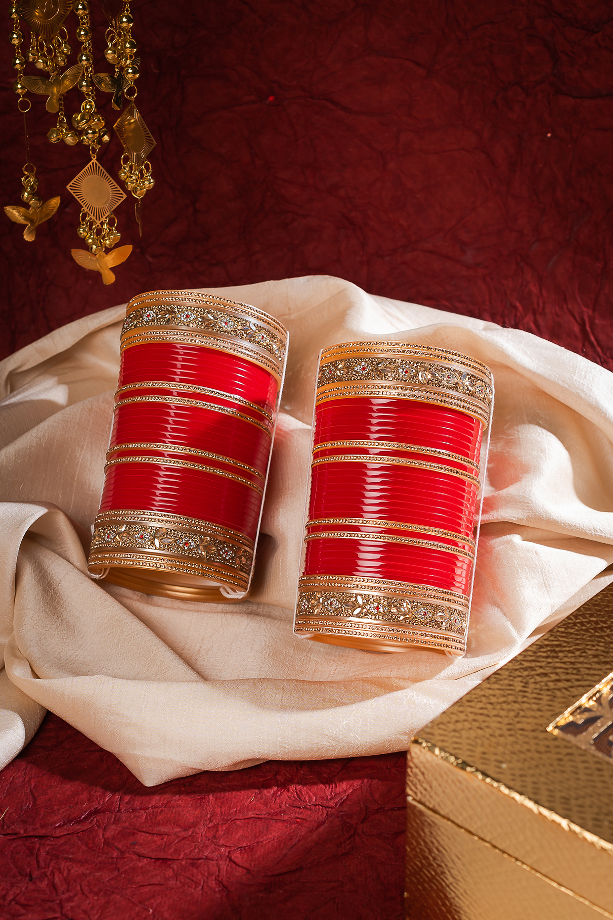 Gold Finish Red Chuda Bangles (Set Of 2) by Vivinia By Vidhi Mehra at Pernia's Pop Up Shop