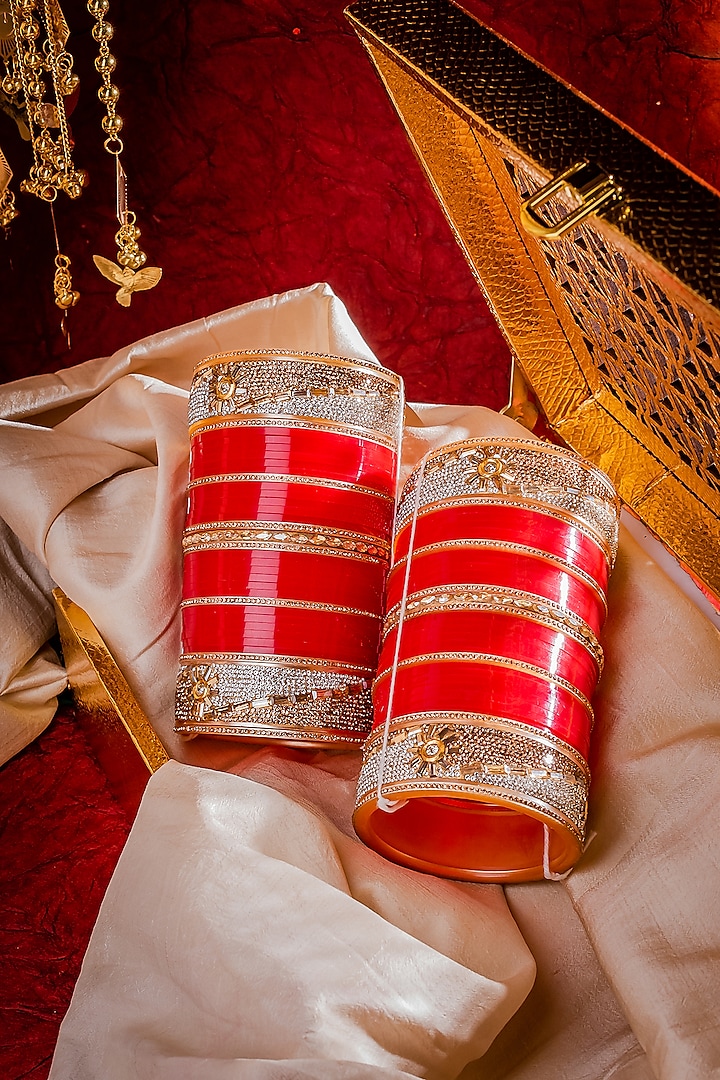 Gold Finish Red Chuda Bangles (Set Of 2) by Vivinia By Vidhi Mehra at Pernia's Pop Up Shop