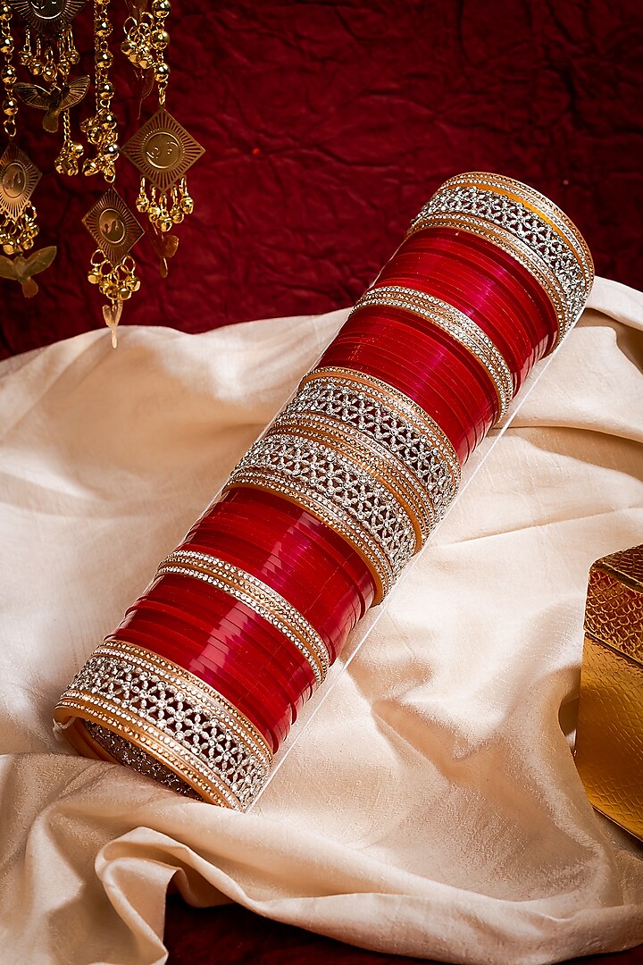 Gold Finish Red Chuda Bangles (Set Of 2) by Vivinia By Vidhi Mehra at Pernia's Pop Up Shop