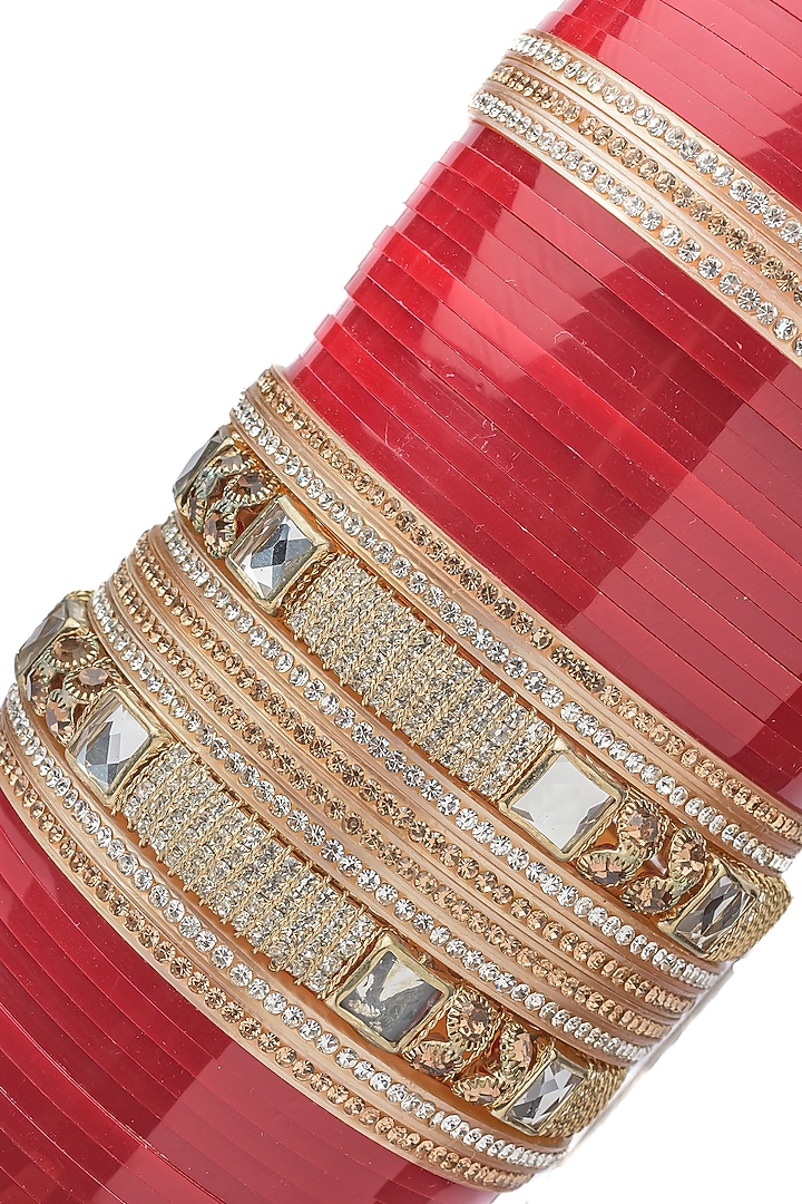 Gold Finish Red Chuda Bangles (Set Of 2) by Vivinia By Vidhi Mehra at Pernia's Pop Up Shop