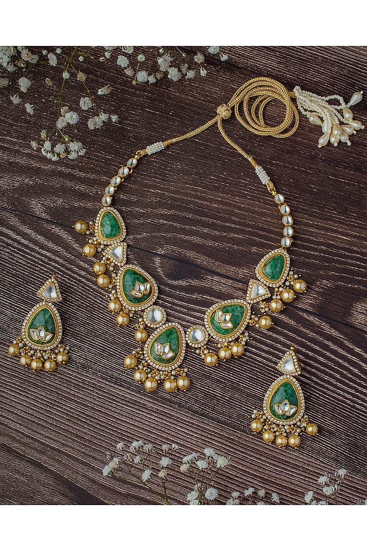 Gold Finish Kundan Polki & Green Stone Choker Necklace by Vivinia By Vidhi Mehra at Pernia's Pop Up Shop