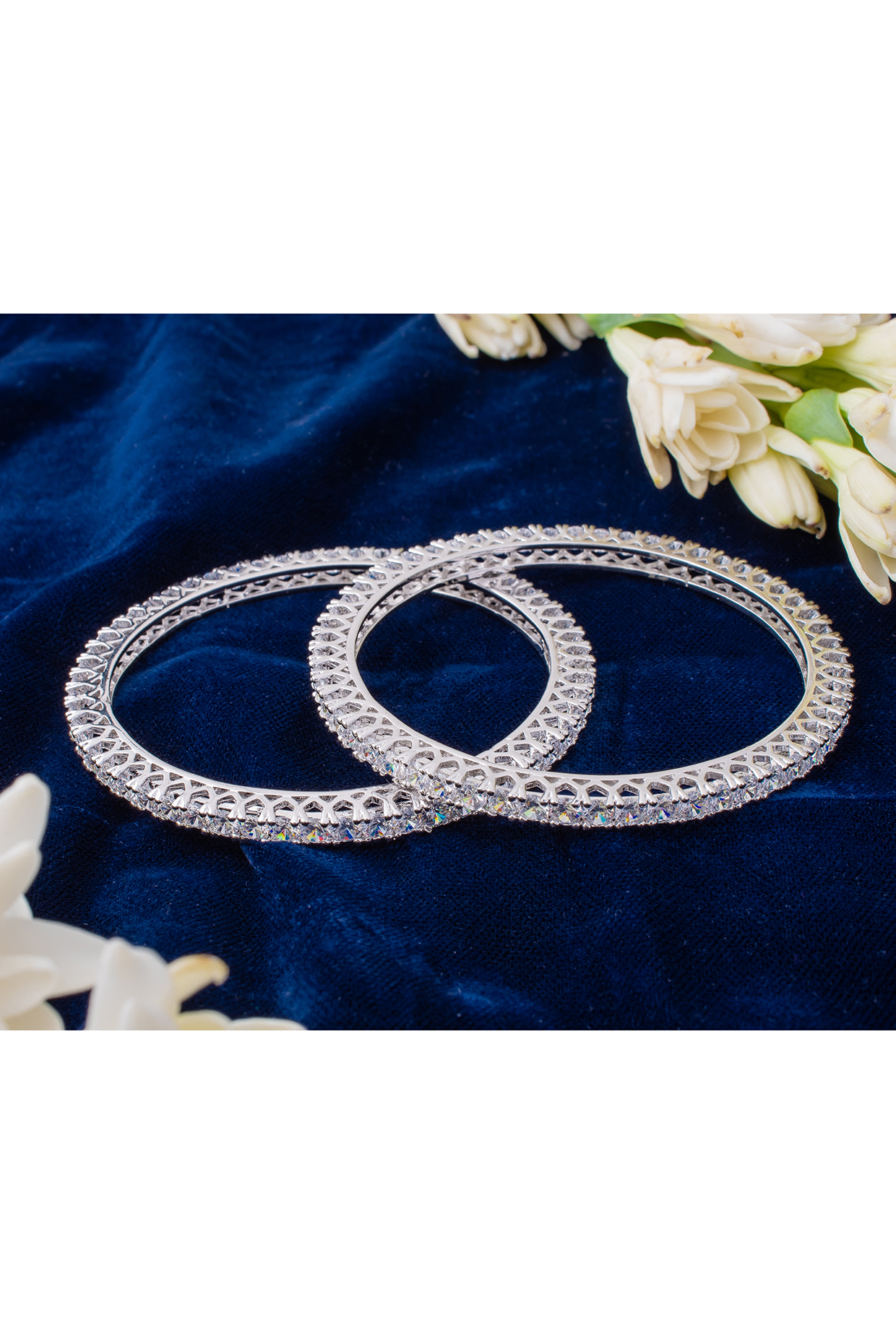 Silver Finish Zircon Bangles (Set Of 2) by Vivinia By Vidhi Mehra at Pernia's Pop Up Shop