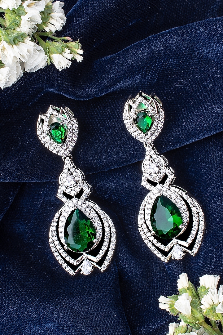 Silver Finish Zircon & Green Gem Stone Dangler Earrings by Vivinia By Vidhi Mehra at Pernia's Pop Up Shop