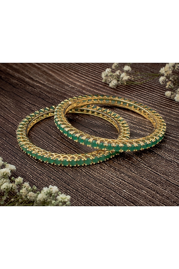 Gold Finish Green Gemstone Bangles (Set Of 2) by Vivinia By Vidhi Mehra at Pernia's Pop Up Shop