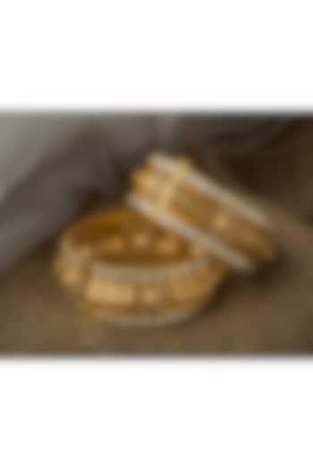Gold Finish Kundan Polki & Mirror Work Bangles (Set Of 2) by Vivinia By Vidhi Mehra at Pernia's Pop Up Shop