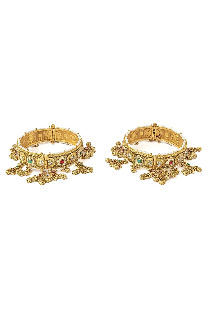 Gold Finish Kundan Polki & Gemstone Bangles (Set Of 2) by Vivinia By Vidhi Mehra at Pernia's Pop Up Shop