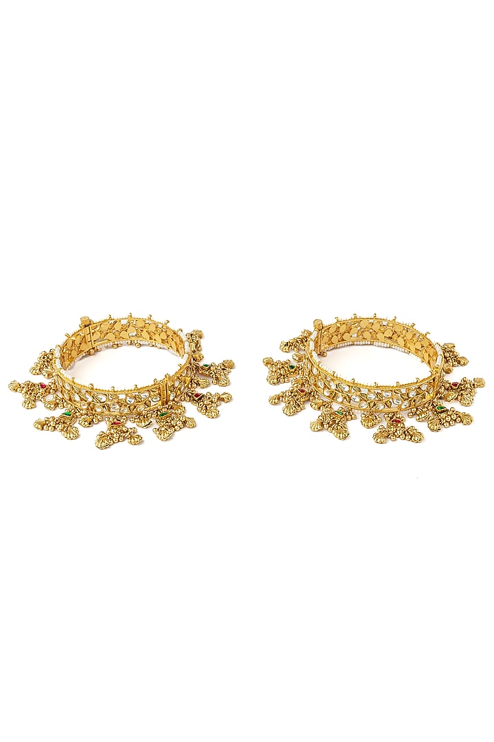 Gold Finish Kundan Polki Bangles (Set Of 2) by Vivinia By Vidhi Mehra at Pernia's Pop Up Shop