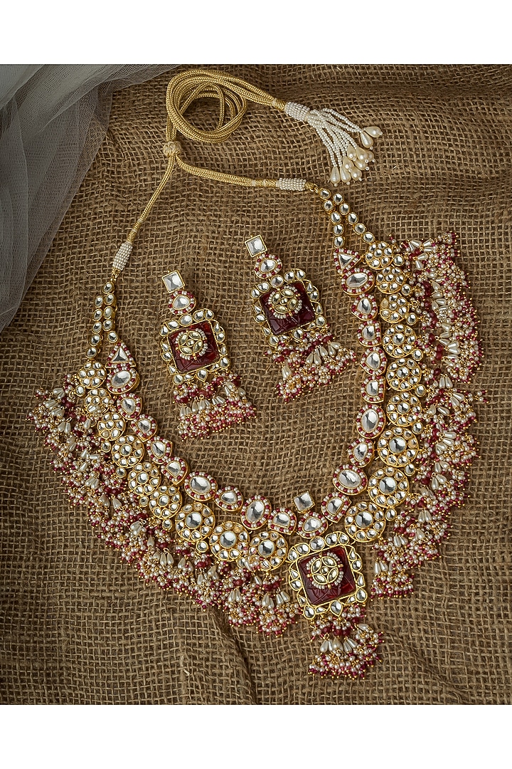 Gold Finish Kundan Polki & Red Gemstone Necklace Set by Vivinia By Vidhi Mehra at Pernia's Pop Up Shop