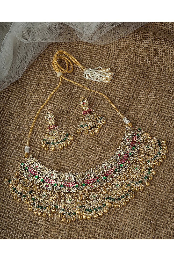 Gold Finish Kundan Polki & Green Gemstone Necklace Set by Vivinia By Vidhi Mehra at Pernia's Pop Up Shop