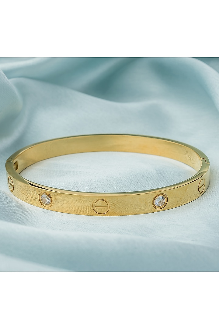 Gold Finish Floral Kada by Vivinia By Vidhi Mehra at Pernia's Pop Up Shop