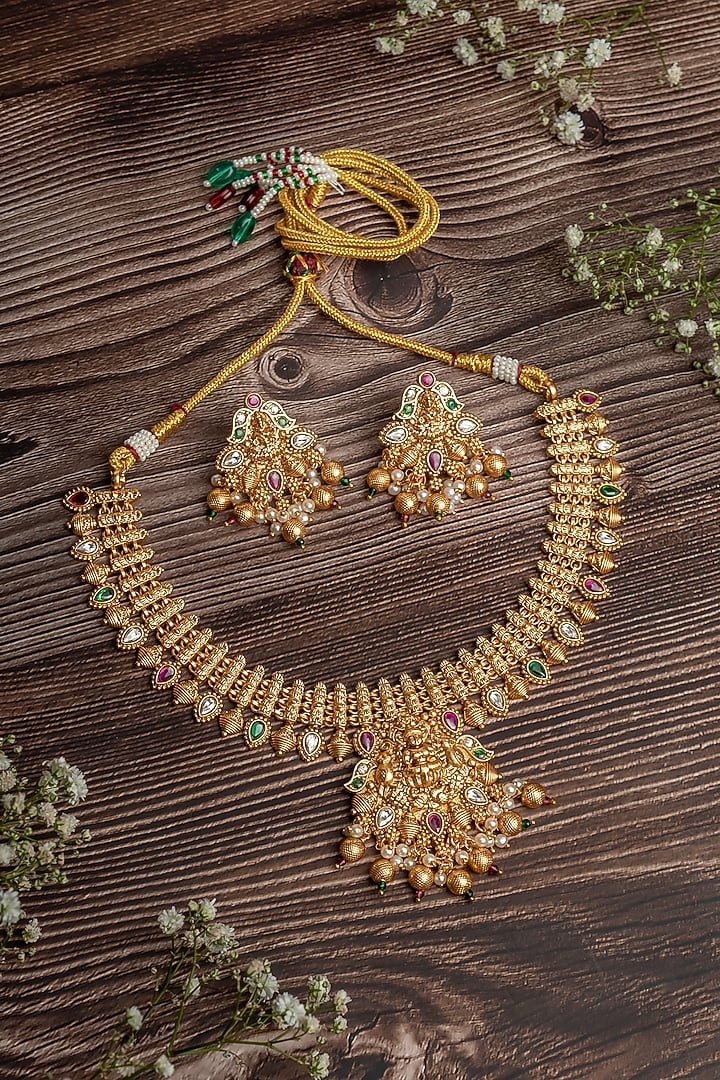 Gold Finish Pendant Necklace Set by Vivinia By Vidhi Mehra at Pernia's Pop Up Shop