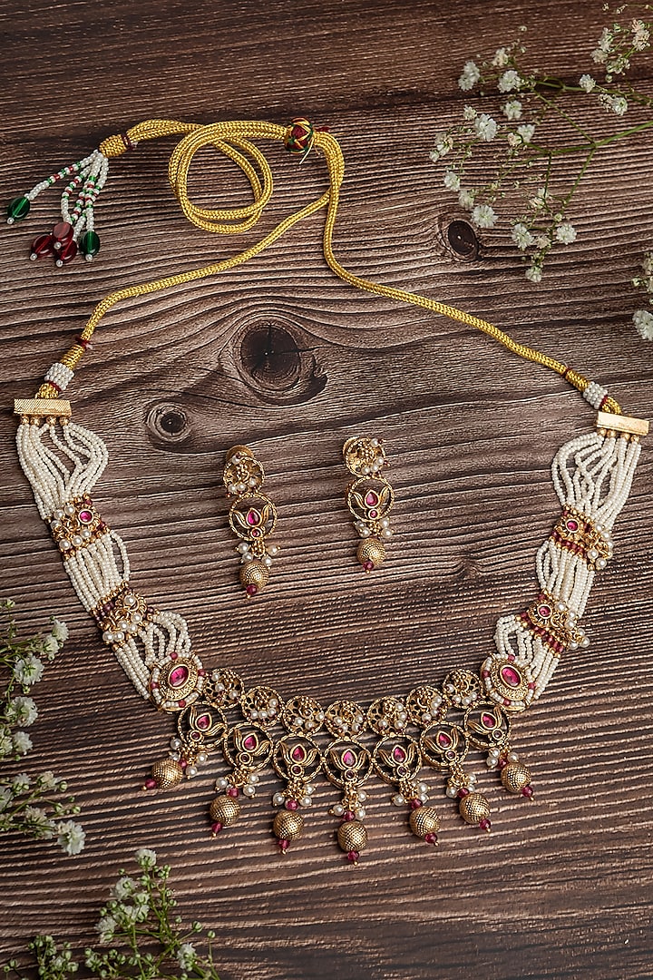 Gold Finish Pearl & Red Stone Choker Necklace Set by Vivinia By Vidhi Mehra at Pernia's Pop Up Shop