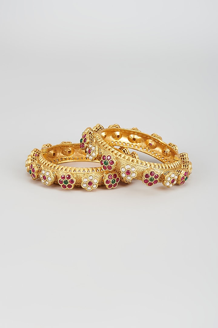 Gold Finish Kundan Polki & Red Stone Kadas (Set of 2) by Vivinia By Vidhi Mehra at Pernia's Pop Up Shop