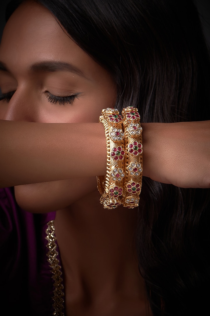 Gold Finish Kundan Polki & Red Stone Kadas (Set of 2) by Vivinia By Vidhi Mehra at Pernia's Pop Up Shop