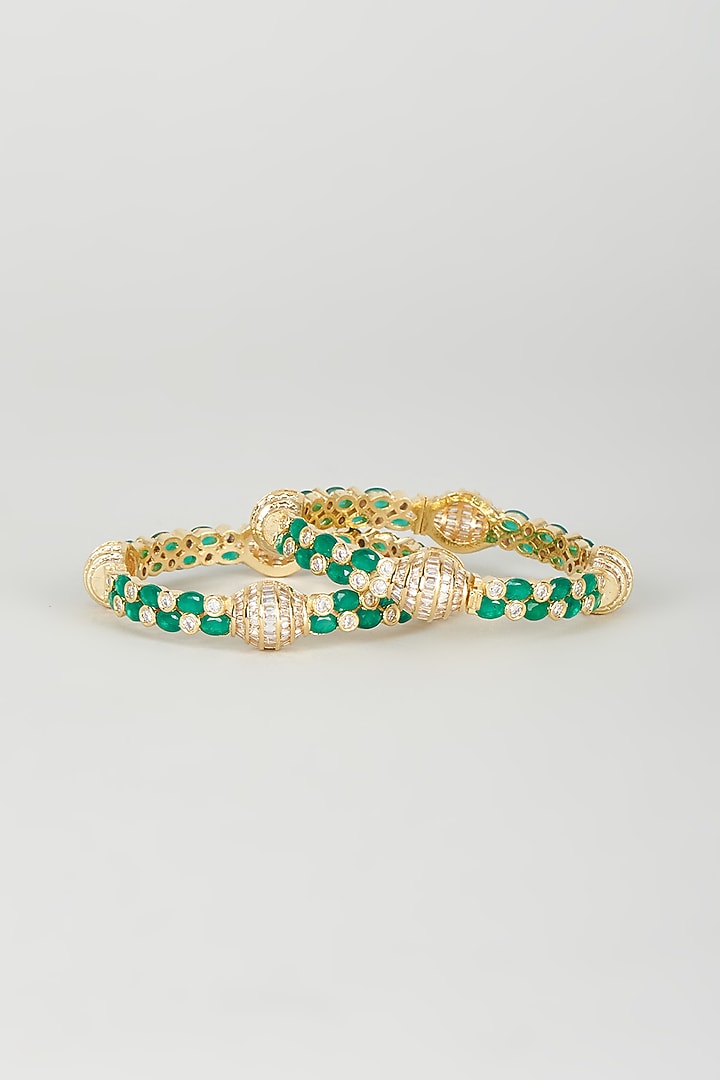 Gold Finish Emerald Synthetic Stone Bangles (Set of 2) by Vivinia By Vidhi Mehra at Pernia's Pop Up Shop