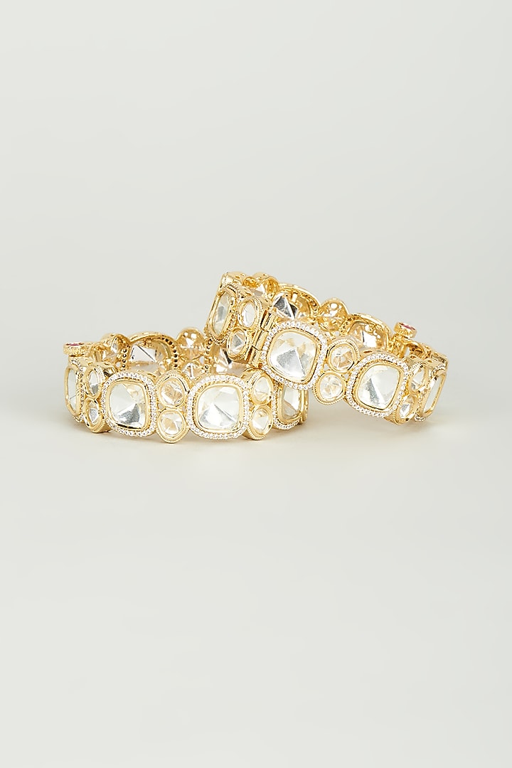 Gold Finish Kundan Polki Bangles (Set of 2) by Vivinia By Vidhi Mehra at Pernia's Pop Up Shop