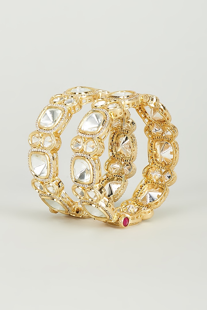 Gold Finish Kundan Polki Bangles (Set of 2) by Vivinia By Vidhi Mehra at Pernia's Pop Up Shop