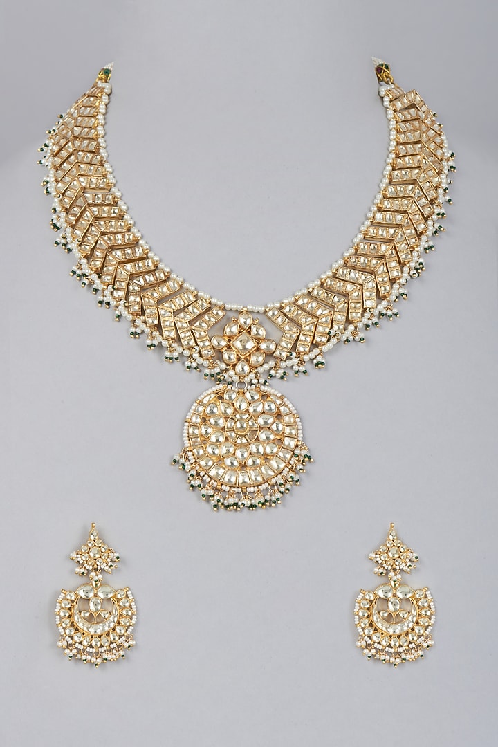 Gold Finish Kundan Polki Necklace Set by Vivinia By Vidhi Mehra at Pernia's Pop Up Shop
