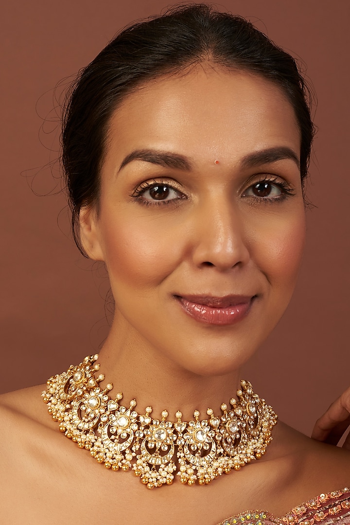 Gold Finish Kundan Polki & Pearl Choker Necklace by Vivinia By Vidhi Mehra at Pernia's Pop Up Shop