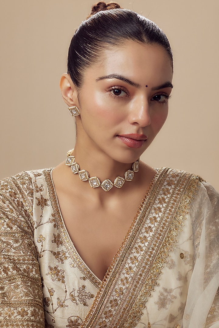 Gold Finish Kundan Polki & Red Stone Choker Necklace Set by Vivinia By Vidhi Mehra at Pernia's Pop Up Shop