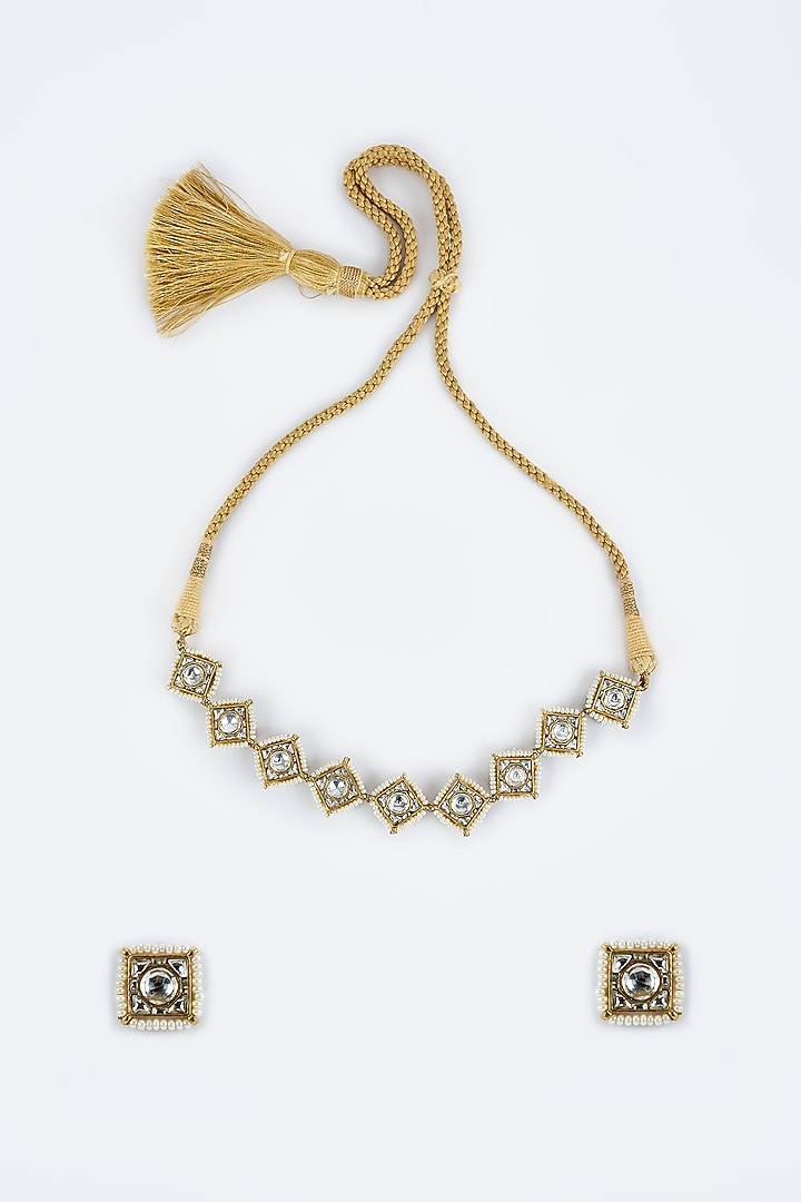 Gold Finish Kundan Polki & Red Stone Choker Necklace Set by Vivinia By Vidhi Mehra at Pernia's Pop Up Shop