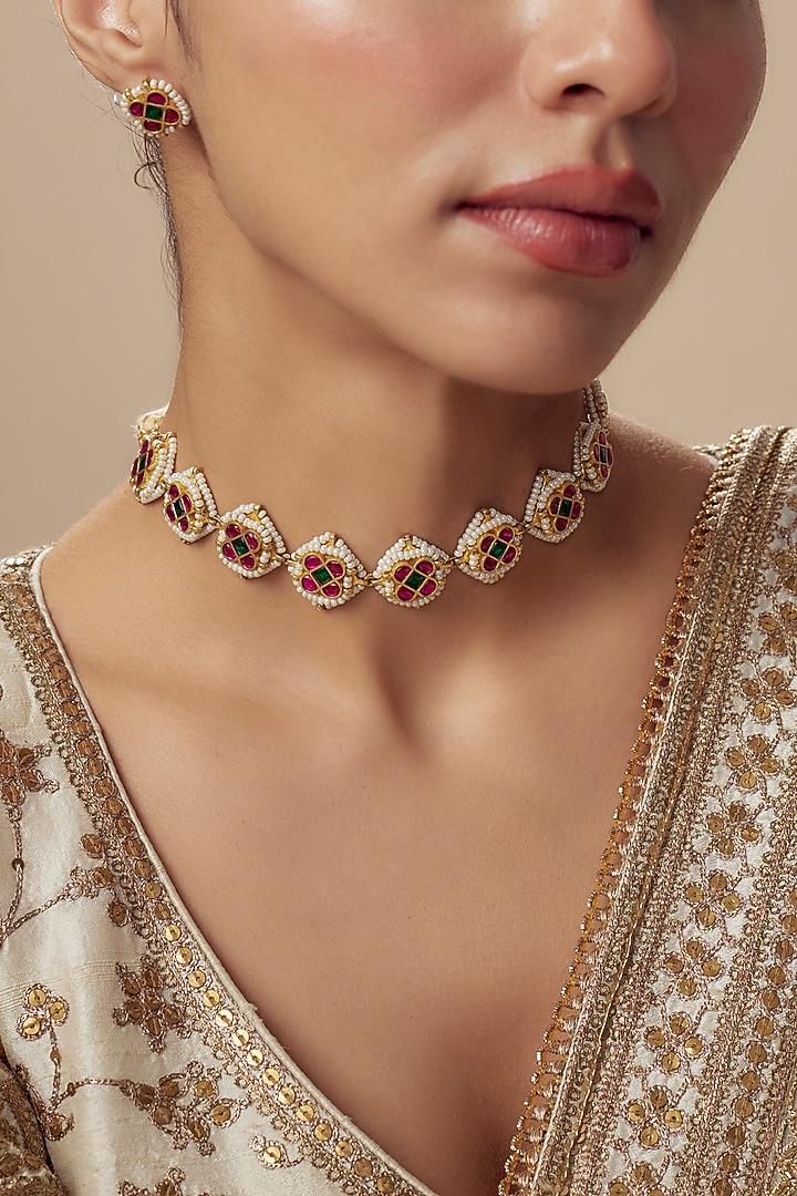 Gold Finish Kundan Polki & Red Stone Choker Necklace Set by Vivinia By Vidhi Mehra at Pernia's Pop Up Shop