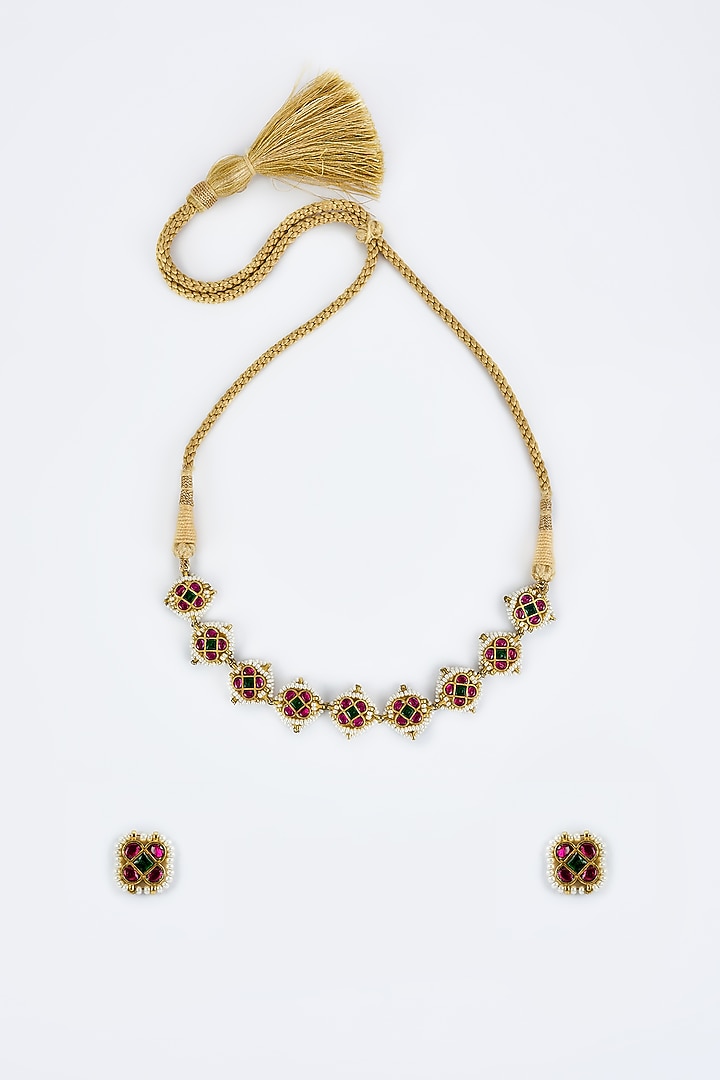 Gold Finish Kundan Polki & Red Stone Choker Necklace Set by Vivinia By Vidhi Mehra at Pernia's Pop Up Shop