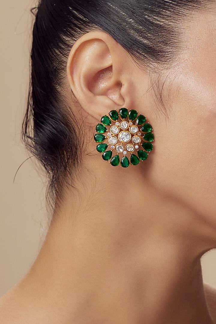 Gold Finish Moissanite Polki & Emerald Green Stone Stud Earrings by Vivinia By Vidhi Mehra at Pernia's Pop Up Shop