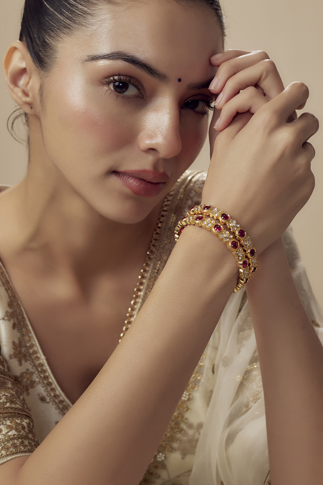 Gold Finish Kundan Polki & Ruby Synthetic Bangles (Set Of 2) by Vivinia By Vidhi Mehra at Pernia's Pop Up Shop