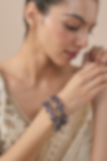 Gold Finish Blue Diamond Beaded Bangles (Set Of 2) by Vivinia By Vidhi Mehra at Pernia's Pop Up Shop