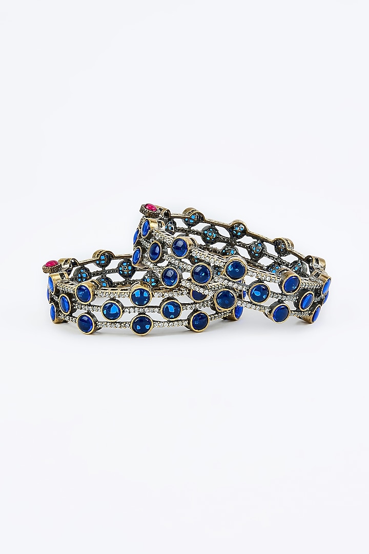 Gold Finish Blue Diamond Beaded Bangles (Set Of 2) by Vivinia By Vidhi Mehra at Pernia's Pop Up Shop