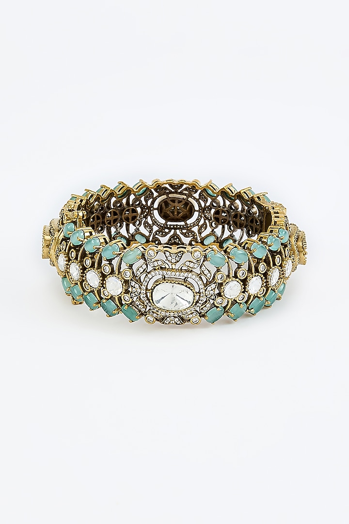 Gold Finish Zircon & Aqua Stone Bangle by Vivinia By Vidhi Mehra at Pernia's Pop Up Shop