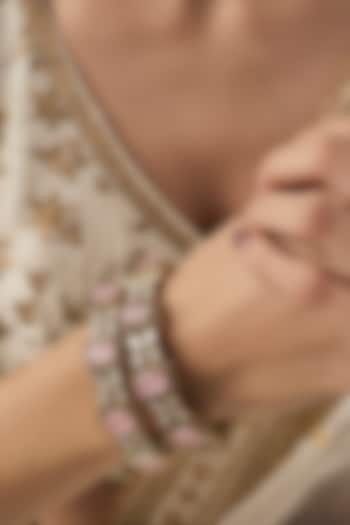Gold Finish Zircon & Ruby Synthetic Stone Bangles (Set Of 2) by Vivinia By Vidhi Mehra at Pernia's Pop Up Shop