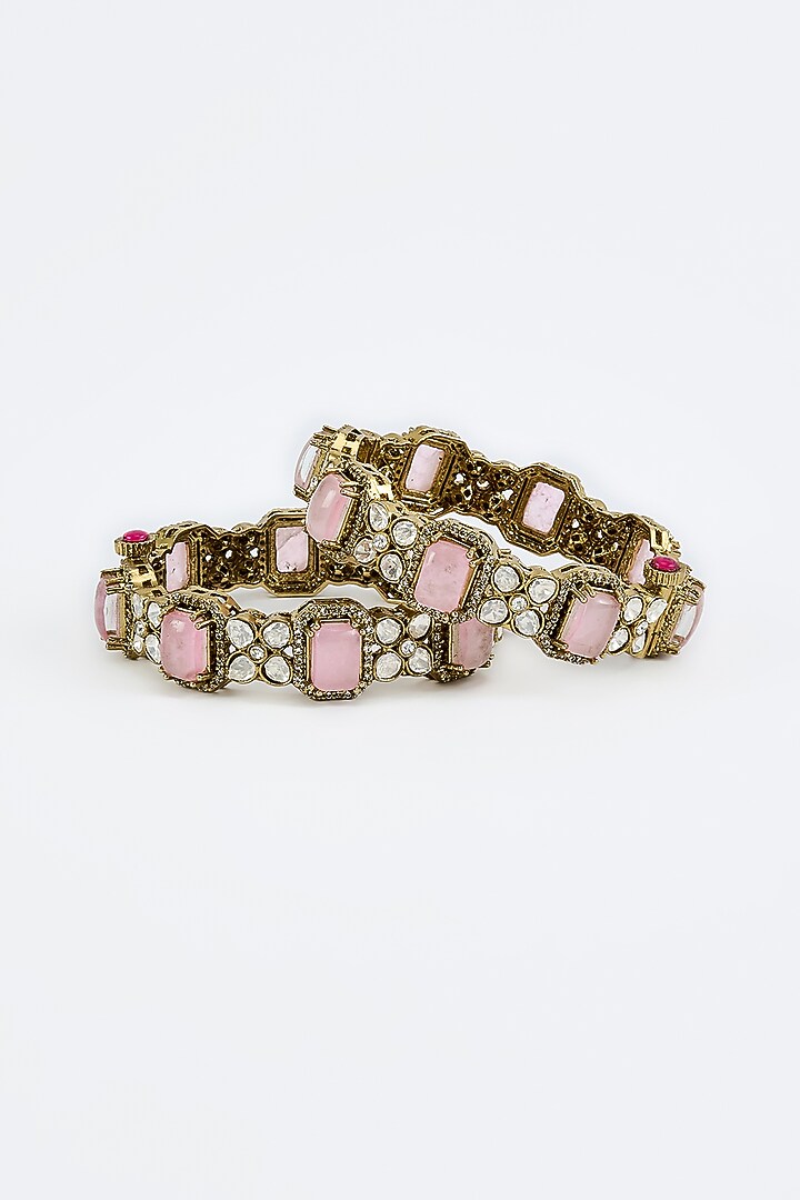 Gold Finish Zircon & Ruby Synthetic Stone Bangles (Set Of 2) by Vivinia By Vidhi Mehra at Pernia's Pop Up Shop