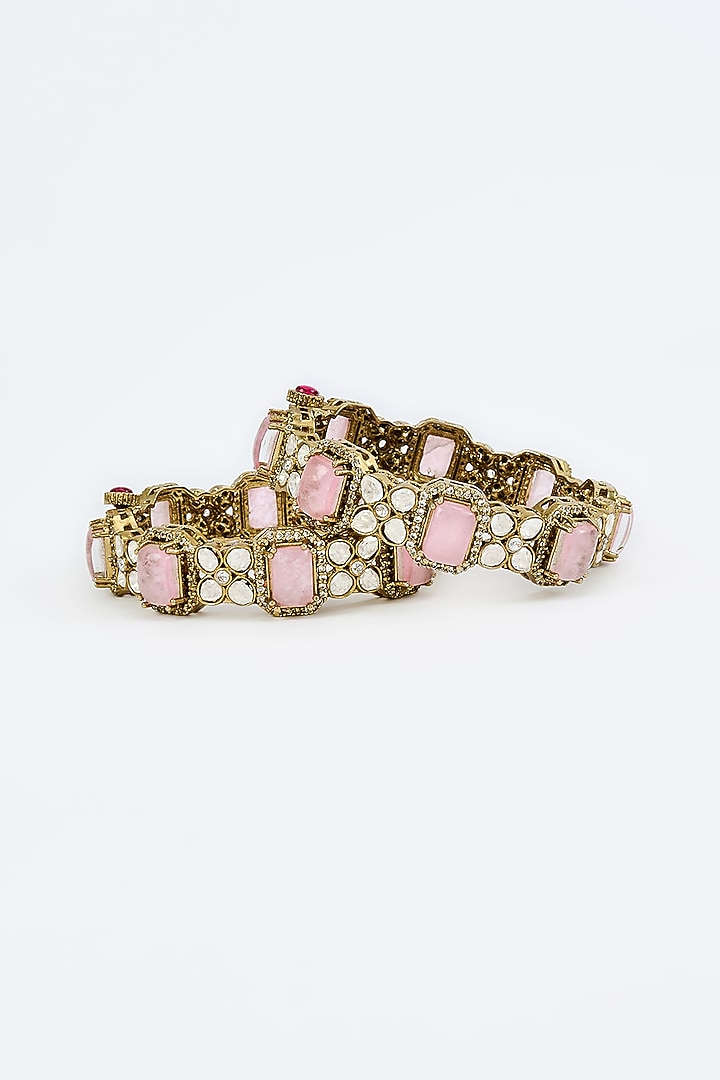 Gold Finish Zircon & Ruby Synthetic Stone Bangles (Set Of 2) by Vivinia By Vidhi Mehra at Pernia's Pop Up Shop