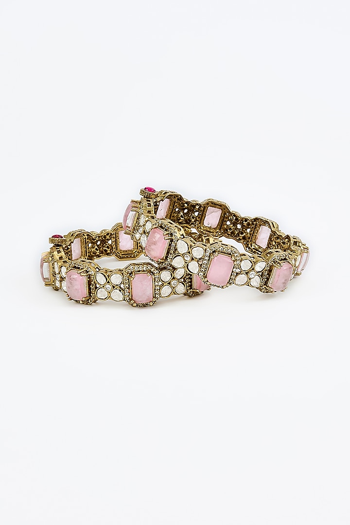 Gold Finish Zircon & Ruby Synthetic Stone Bangles (Set Of 2) by Vivinia By Vidhi Mehra at Pernia's Pop Up Shop