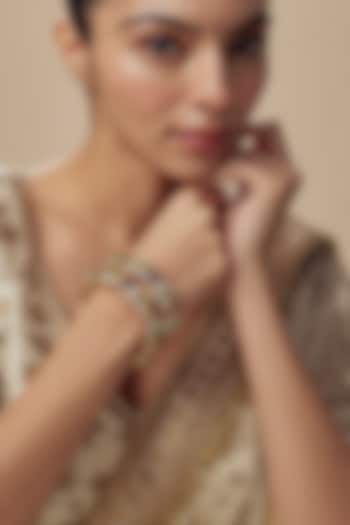 Gold Finish Floral Motifs Kundan Polki Kada (Set Of 2) by Vivinia By Vidhi Mehra at Pernia's Pop Up Shop