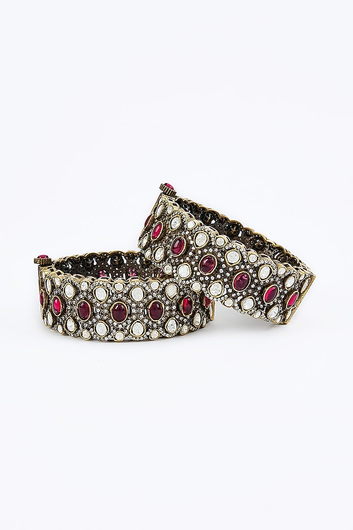 Gold Finish Kundan Polki & Ruby Stone Bangles (Set Of 2) by Vivinia By Vidhi Mehra at Pernia's Pop Up Shop