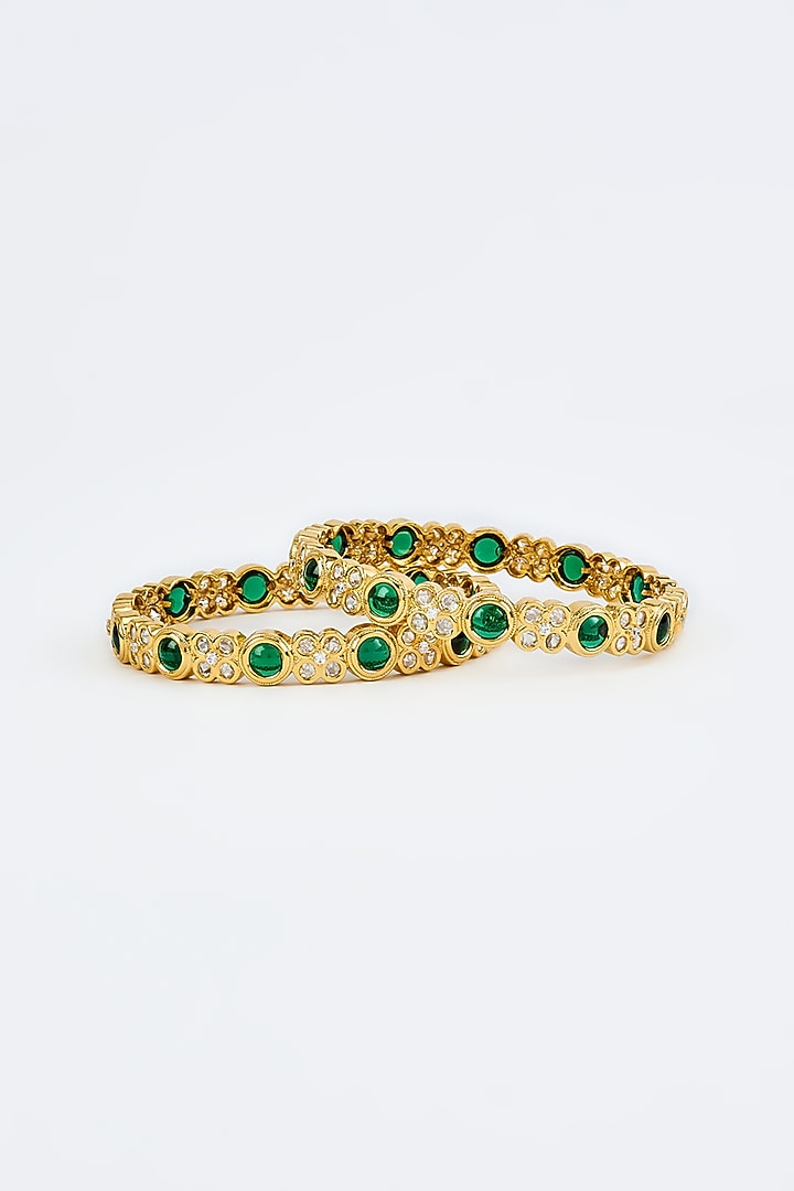 Gold Finish Kundan Polki Bangles (Set Of 2) by Vivinia By Vidhi Mehra at Pernia's Pop Up Shop