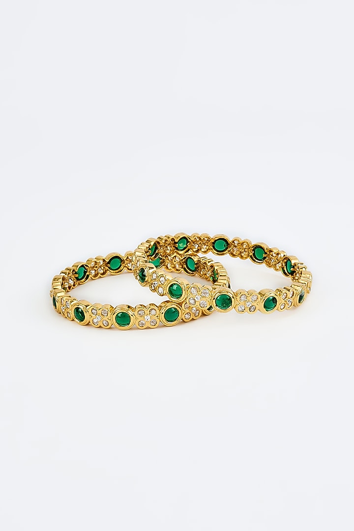 Gold Finish Kundan Polki Bangles (Set Of 2) by Vivinia By Vidhi Mehra at Pernia's Pop Up Shop