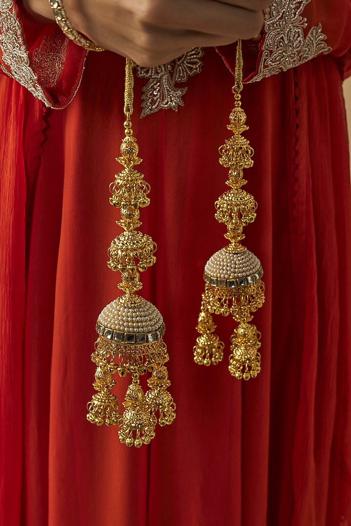 Gold Finish Kundan Polki & Pearl Strand Kaleeras (Set Of 2) by Vivinia By Vidhi Mehra at Pernia's Pop Up Shop