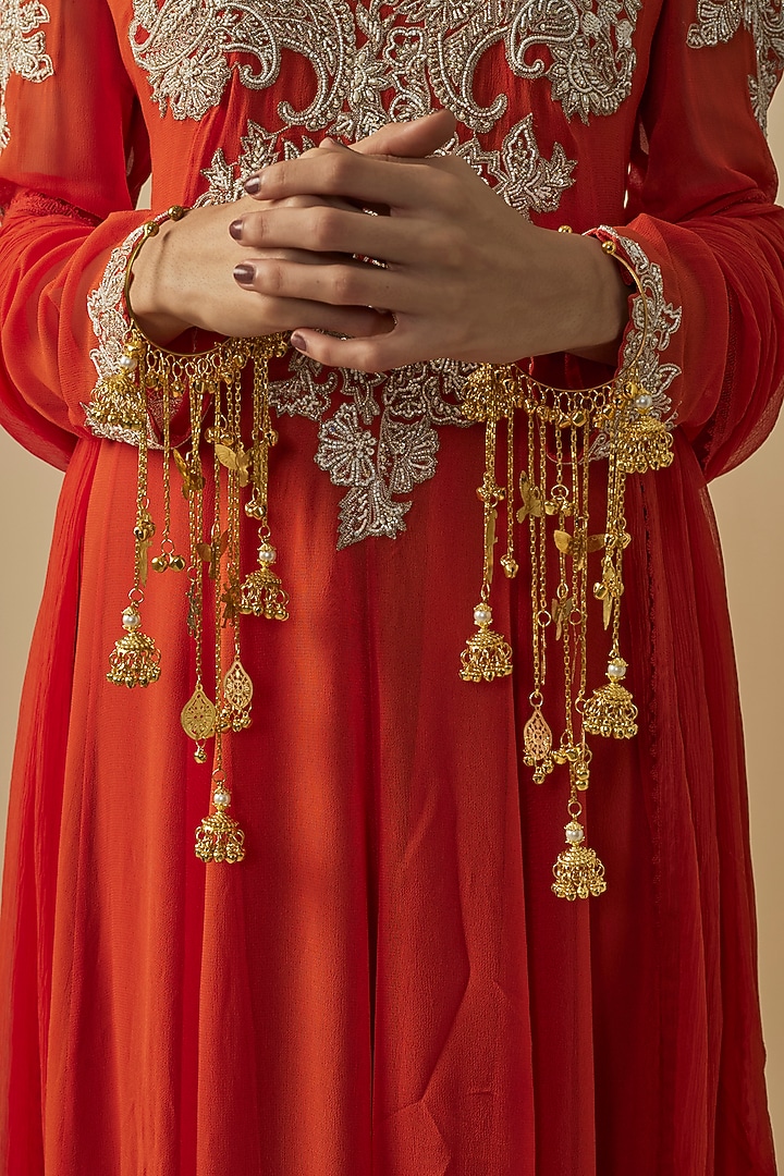 Gold Finish Kundan Polki & Pearl Strand Kaleeras (Set Of 2) by Vivinia By Vidhi Mehra at Pernia's Pop Up Shop